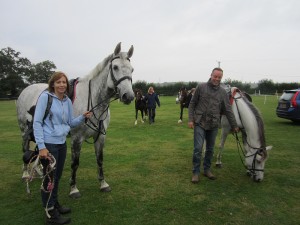 Parents holding the ponies